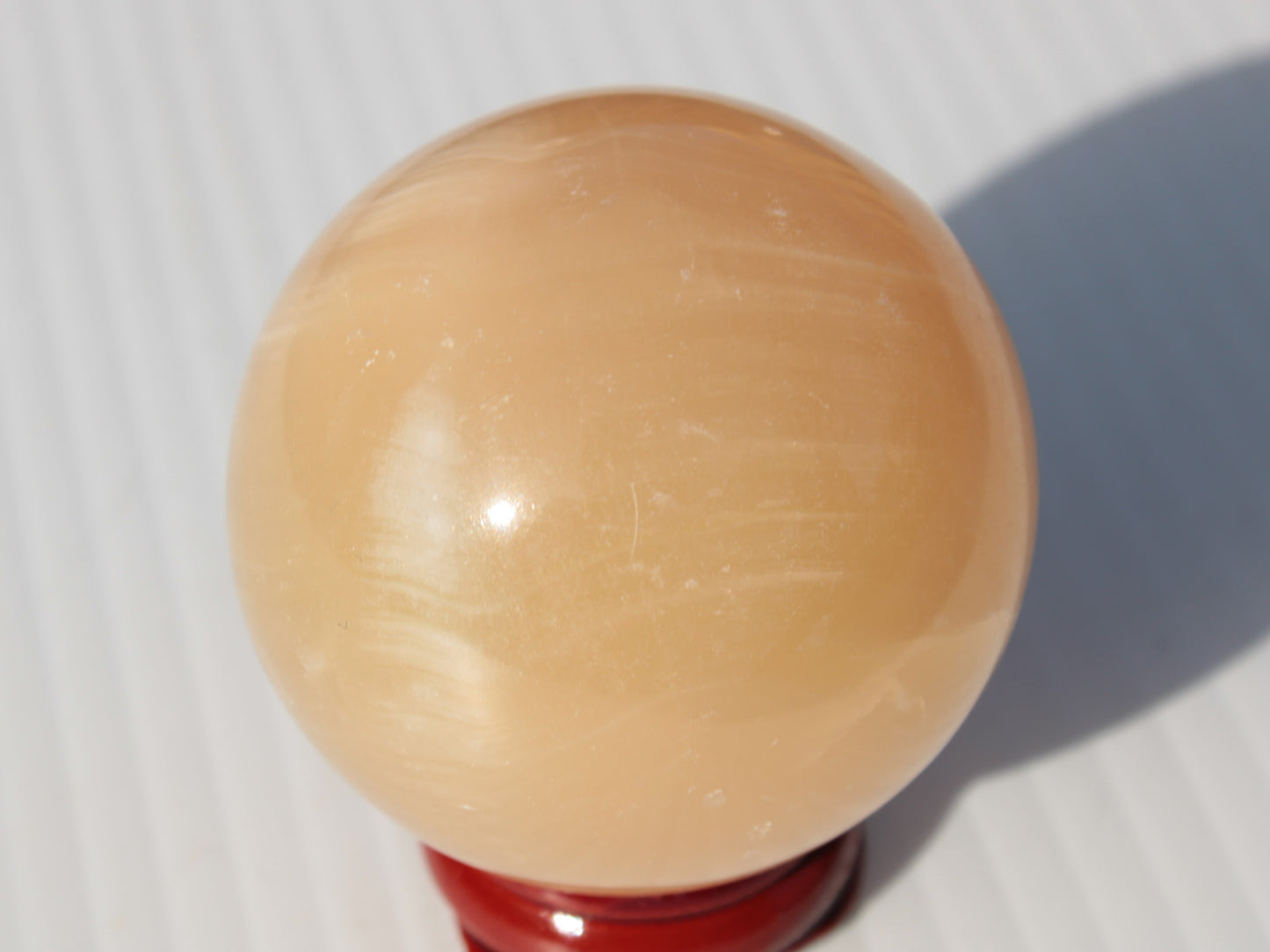 Honey Calcite sphere 49mm 167g Rocks and Things