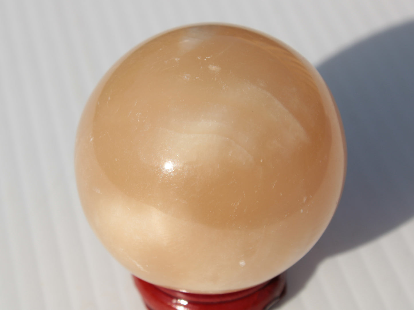 Honey Calcite sphere 49mm 167g Rocks and Things