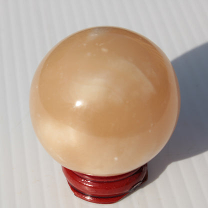 Honey Calcite sphere 49mm 167g Rocks and Things