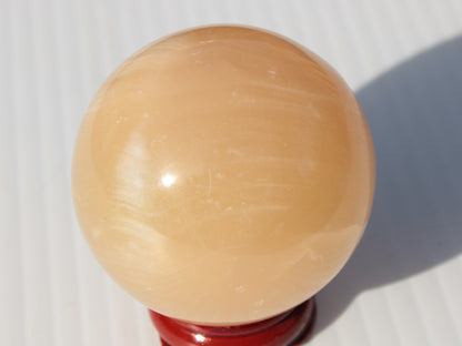 Honey Calcite sphere 49mm 167g Rocks and Things