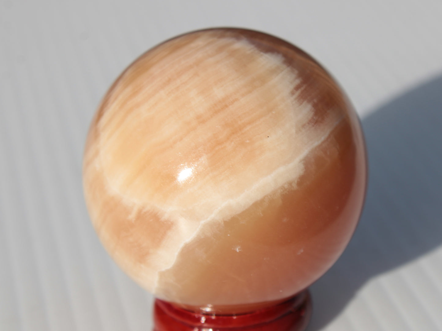 Honey Calcite sphere 53mm 175g Rocks and Things