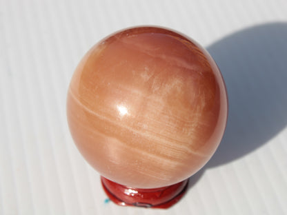 Orange Honey Calcite sphere 51mm 173g Rocks and Things