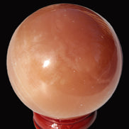 Orange Honey Calcite sphere 51mm 173g in sunshine - Rocks and Things Store