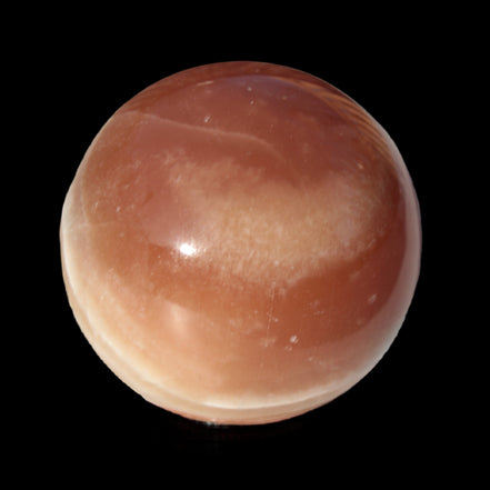 Honey Calcite sphere 55mm 177g in sunlight - Rocks and Things Store