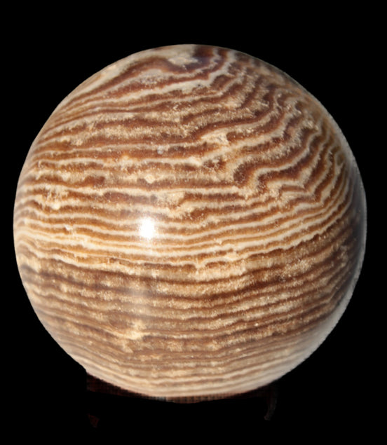 Chocolate Calcite sphere 49mm 171g in sunlight - Rocks and Things Store