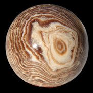 Chocolate Calcite sphere 49mm 171g in sunlight - Rocks and Things Store