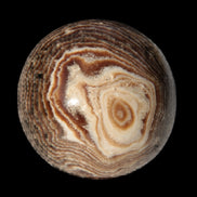 Chocolate Calcite sphere 49mm 171g in sunlight - Rocks and Things Store
