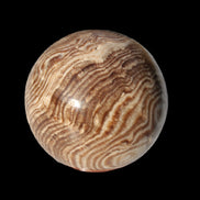 Chocolate Calcite sphere 49mm 171g in sunlight - Rocks and Things Store