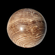 Chocolate Calcite sphere 49mm 171g in sunlight - Rocks and Things Store