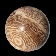 Chocolate Calcite sphere 49mm 171g in sunlight - Rocks and Things Store