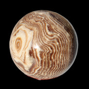 Chocolate Calcite sphere 49mm 171g in sunlight - Rocks and Things Store