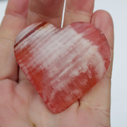 Orange Calcite hand-carved heart 57g Rocks and Things