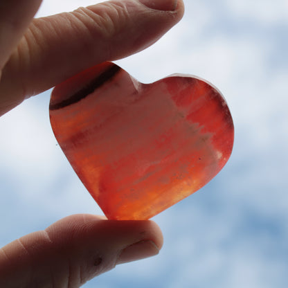 Orange Calcite hand-carved heart 57g Rocks and Things