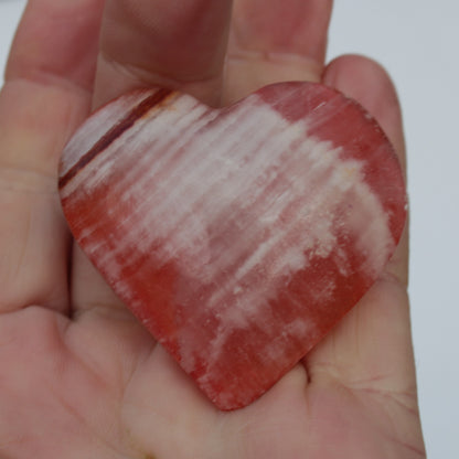 Orange Calcite hand-carved heart 57g Rocks and Things