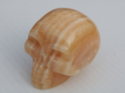 Banded Yellow Calcite skull 49mm 185.6g Rocks and Things