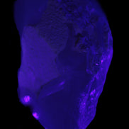 Green Tourmaline crystal on unusual Clear Calcite crystal overgrown dusted Mica layer 144g in UV light - Rocks and Things Store