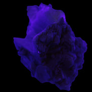 Amphitheatre Feldspar matrix with Mica and Clear Aquamarine and Quartz crystals 65g in UV light