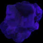 Amphitheatre Feldspar matrix with Mica and Clear Aquamarine and Quartz crystals 65g in UV light