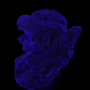 Elestial Smoky & Clear Quartz crystals with Calcite & Elbaite 99.3g in UV light