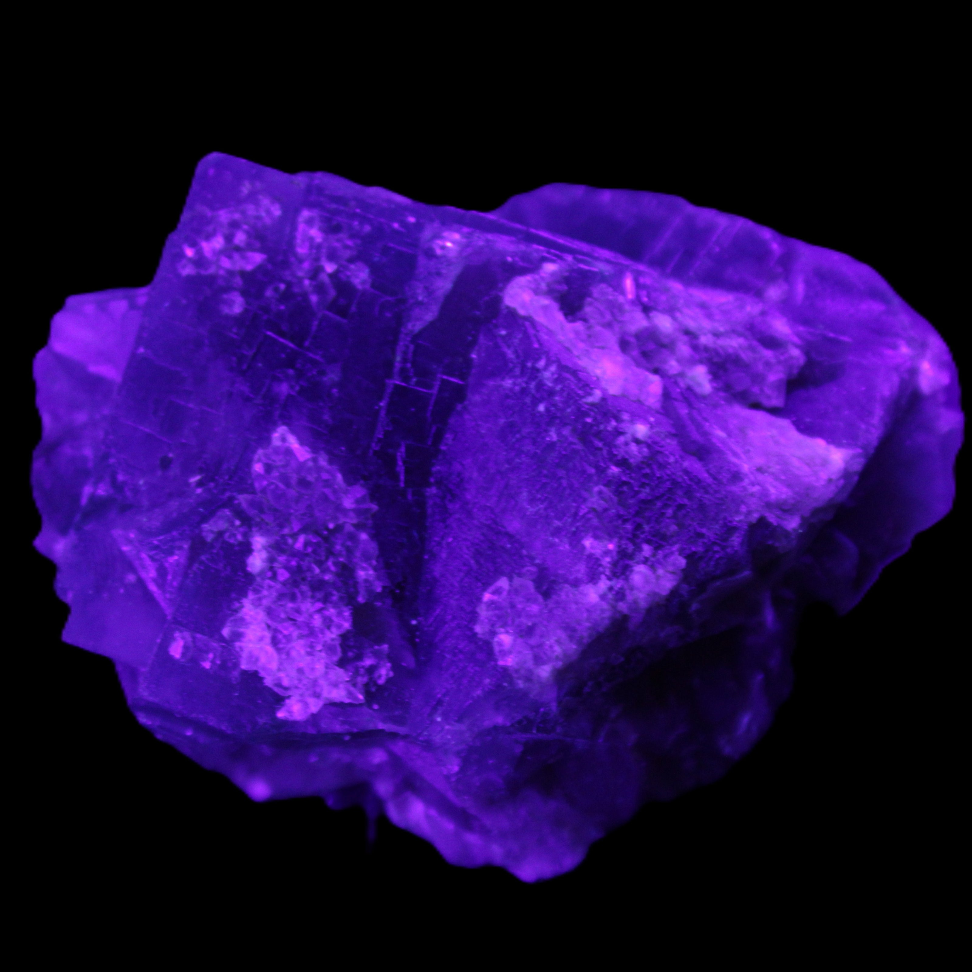 Blue Fluorite cubic cluster with Clear Calcite 168.8g in UV light - Rocks and Things Store