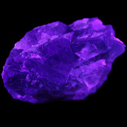 Blue Fluorite cubic cluster with Clear Calcite 168.8g in UV light - Rocks and Things Store