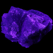 Blue Fluorite cubic cluster with Clear Calcite 168.8g in UV light - Rocks and Things Store