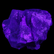 Blue Fluorite cubic cluster with Clear Calcite 168.8g in UV light - Rocks and Things Store