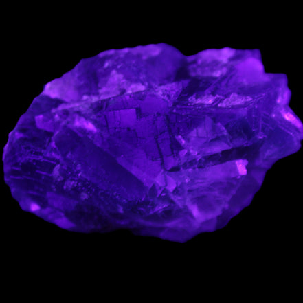 Blue Fluorite cubic cluster with Clear Calcite 168.8g in UV light - Rocks and Things Store