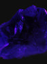 Cubic Blue Fluorite  with Clear Calcite cluster in UV light