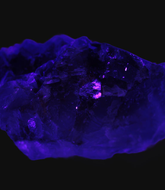 Cubic Blue Fluorite  with Clear Calcite cluster in UV light