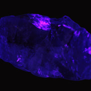 Cubic Blue Fluorite  with Clear Calcite cluster in UV light