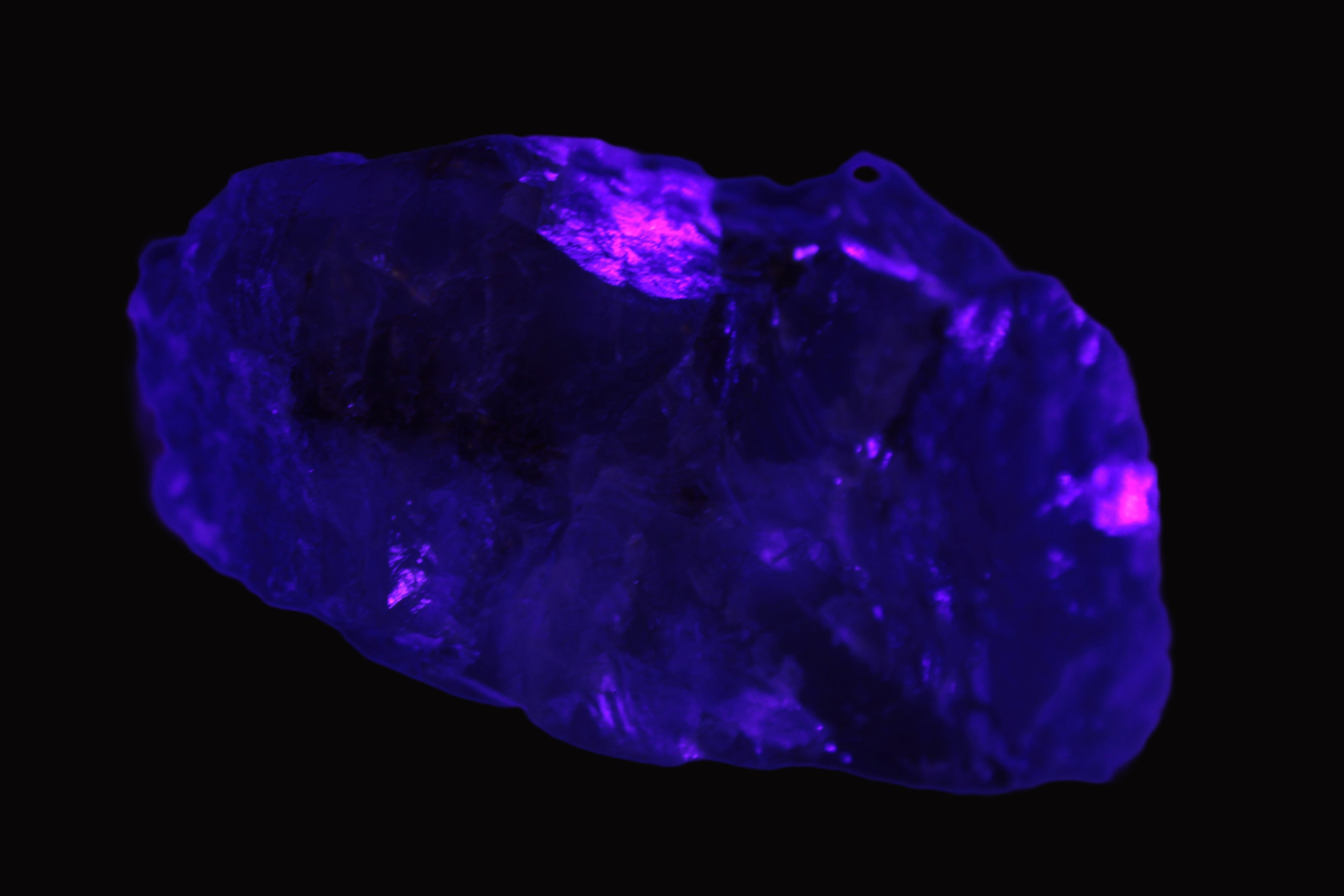 Cubic Blue Fluorite  with Clear Calcite cluster in UV light