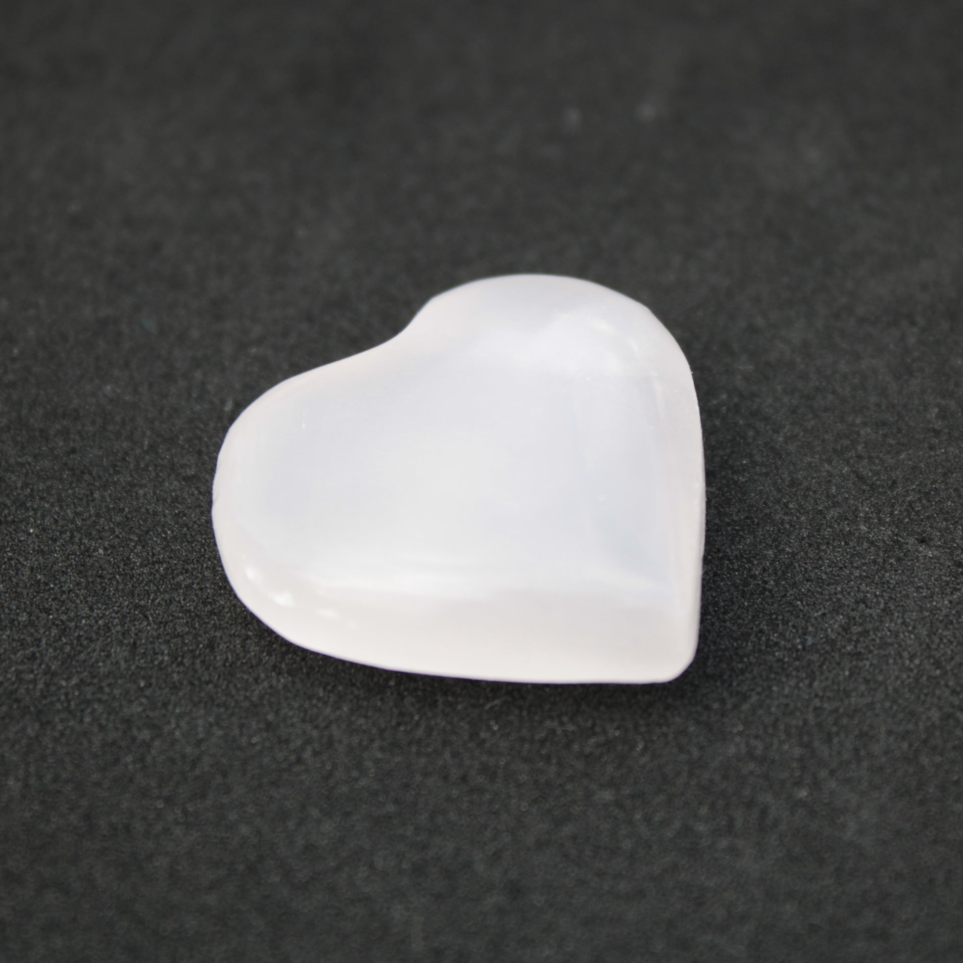 Mangano Calcite hand-carved heart 13-19g Rocks and Things