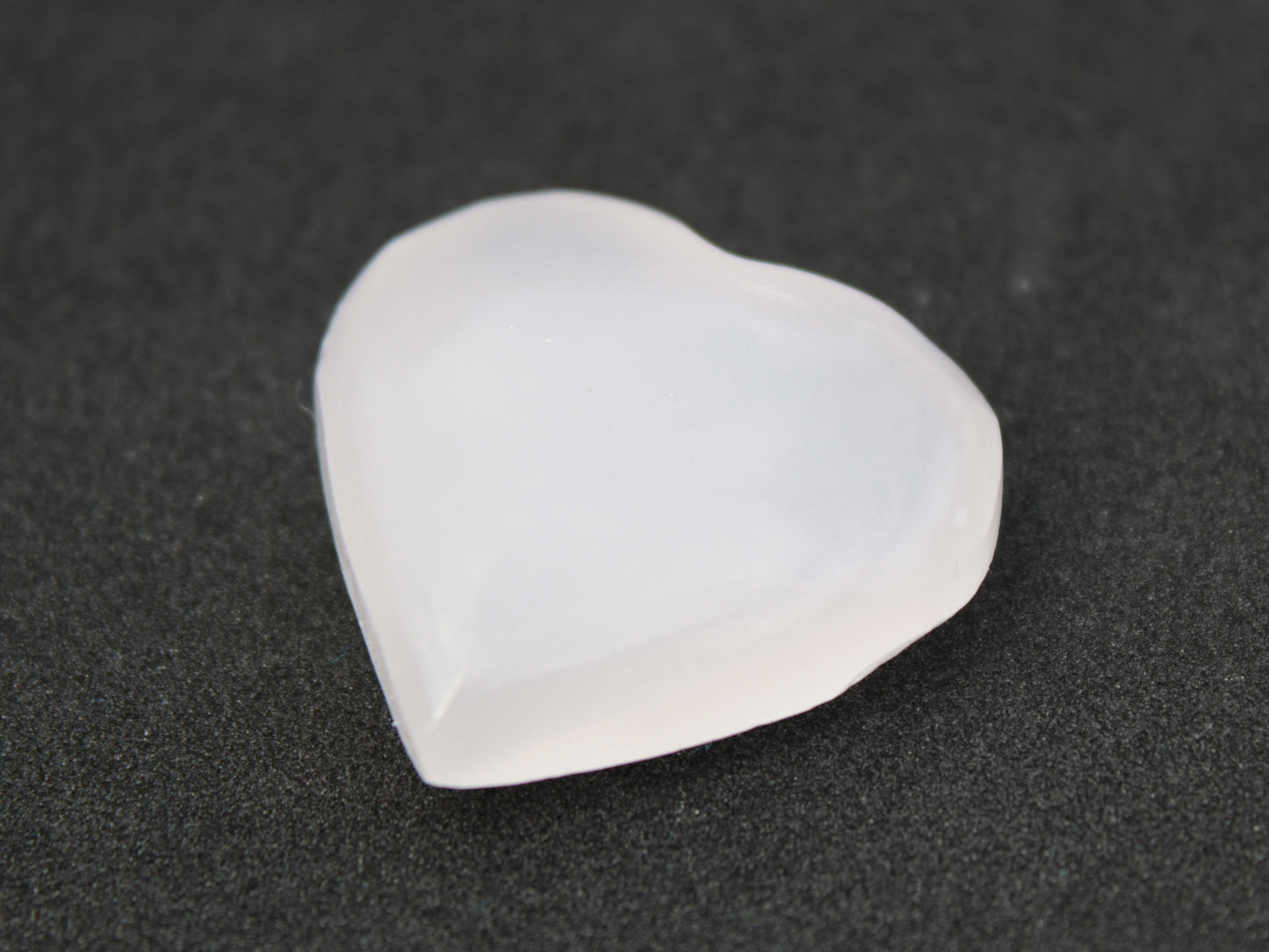 Mangano Calcite hand-carved heart 13-19g Rocks and Things