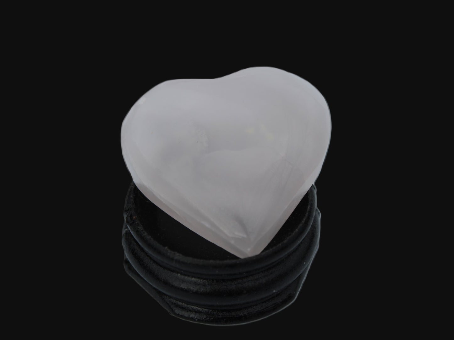 Mangano Calcite hand-carved heart 13-19g Rocks and Things