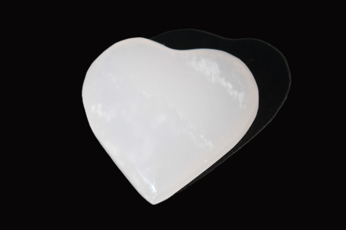 Mangano Calcite hand-carved heart 20-29g Rocks and Things