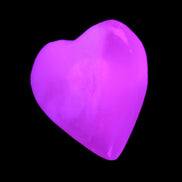Mangano Calcite hand-carved heart 20-29g in UV light - Rocks and Things Store