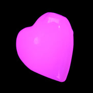 Mangano Calcite hand-carved heart 20-29g in UV light - Rocks and Things Store