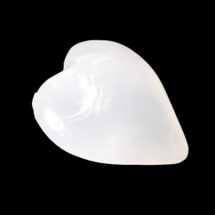 Mangano Calcite hand-carved heart 20-29g in sunlight - Rocks and Things Store