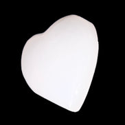 Mangano Calcite hand-carved heart 20-29g in sunlight - Rocks and Things Store