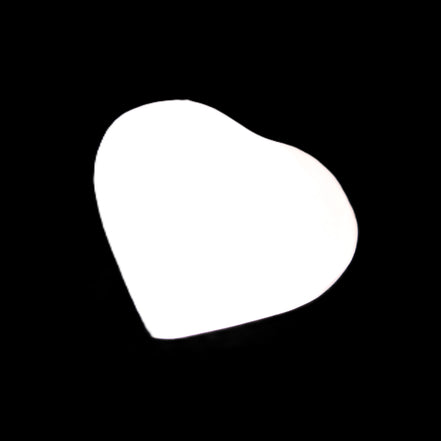 Mangano Calcite hand-carved heart 20-29g in sunlight - Rocks and Things Store