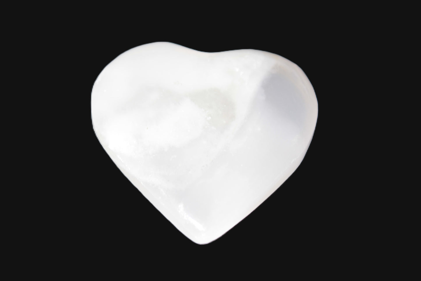 Mangano Calcite hand-carved heart 20-29g Rocks and Things