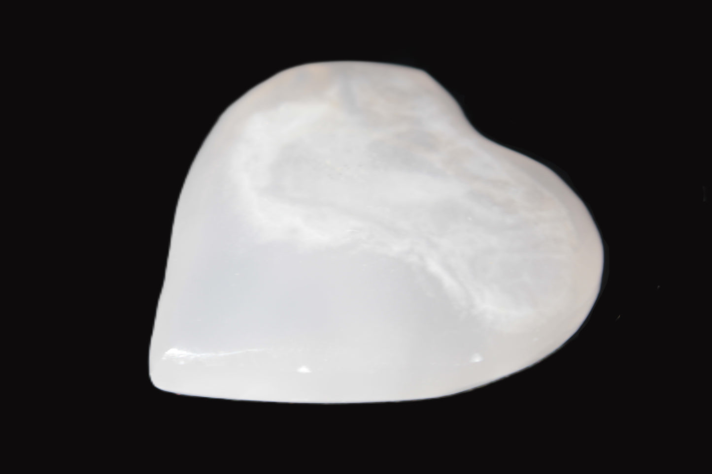 Mangano Calcite hand-carved heart 20-29g Rocks and Things