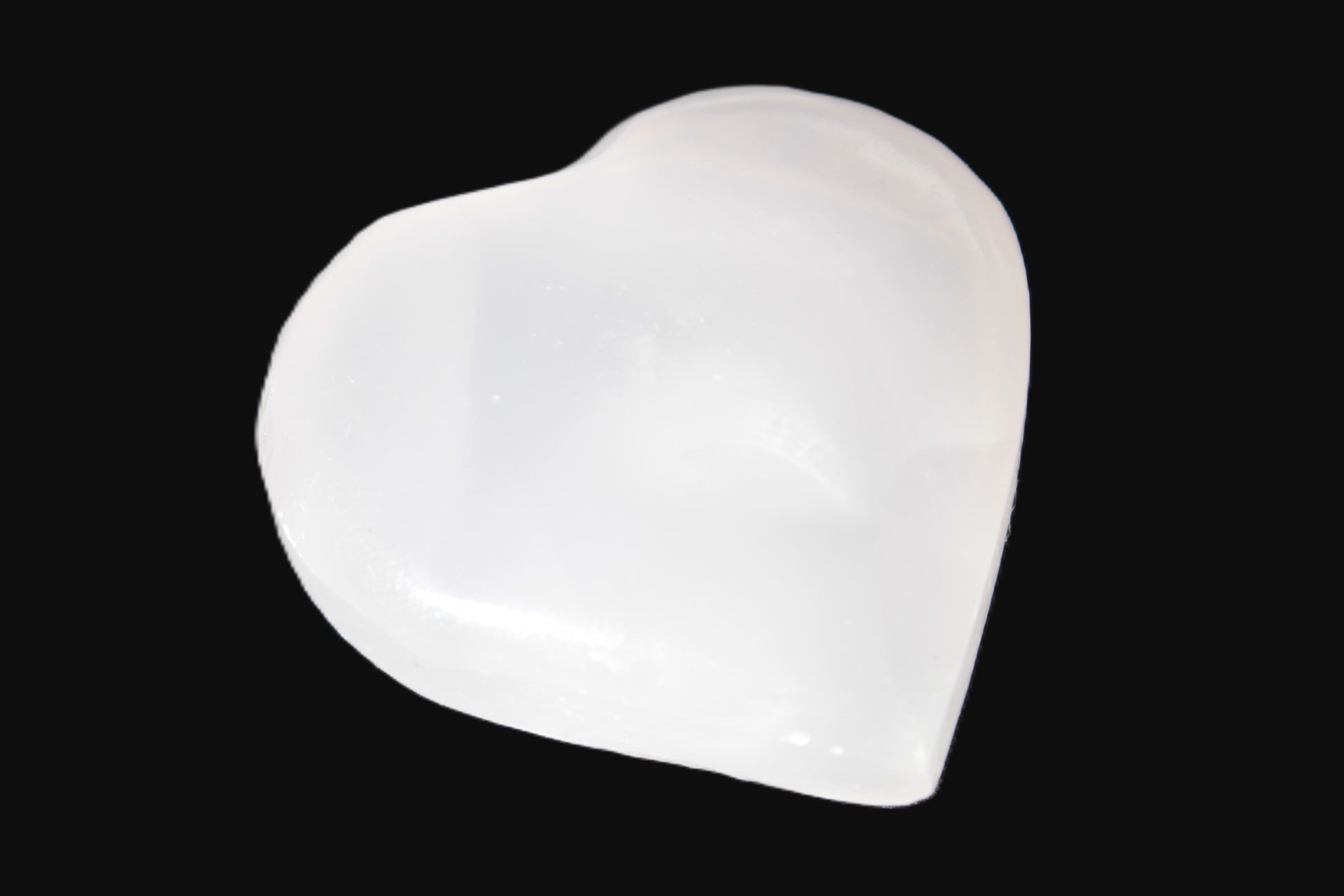 Mangano Calcite hand-carved heart 20-29g Rocks and Things