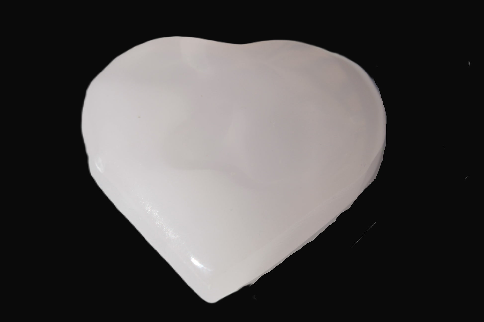 Mangano Calcite hand-carved heart 30-39g Rocks and Things