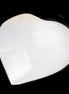 Mangano Calcite hand-carved heart 40-49g in sunlight - Rocks and Things Store