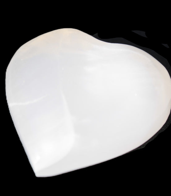 Mangano Calcite hand-carved heart 40-49g in sunlight - Rocks and Things Store