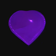 Mangano Calcite hand-carved heart 40-49g in UV light - Rocks and Things Store