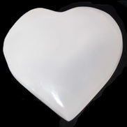 Mangano Calcite hand-carved heart 40-49g in sunlight - Rocks and Things Store
