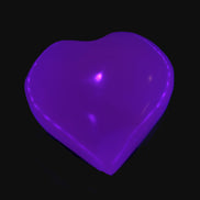 Mangano Calcite hand-carved heart 40-49g in UV light - Rocks and Things Store